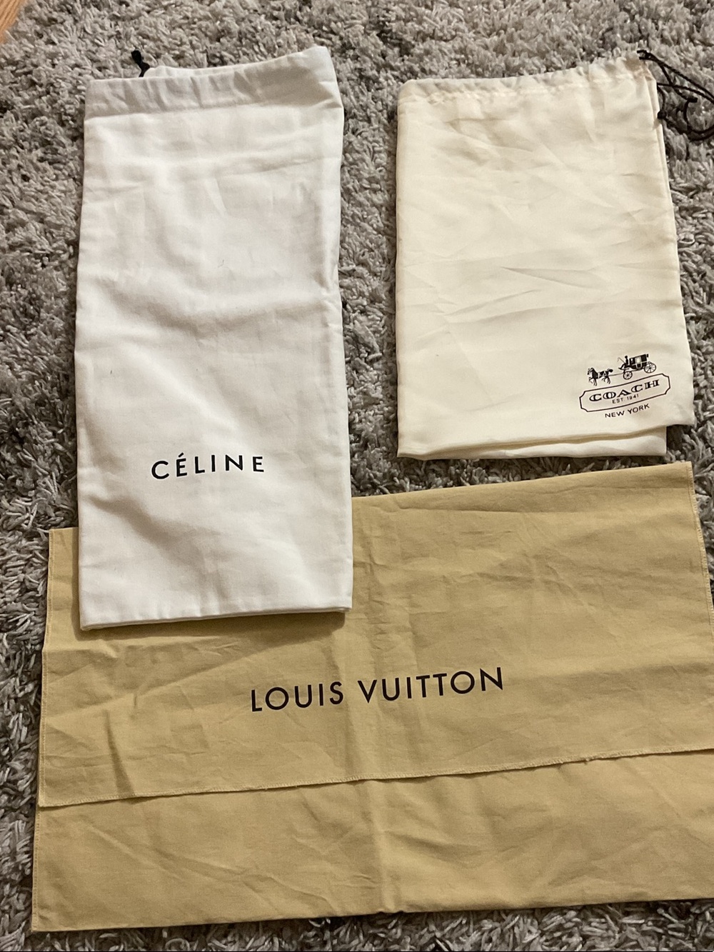 Louis Vuitton beige dust bag with black logo